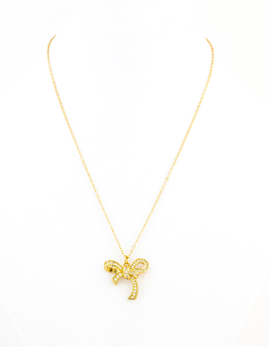 Dije Moño con Zirconias en Baño de Oro