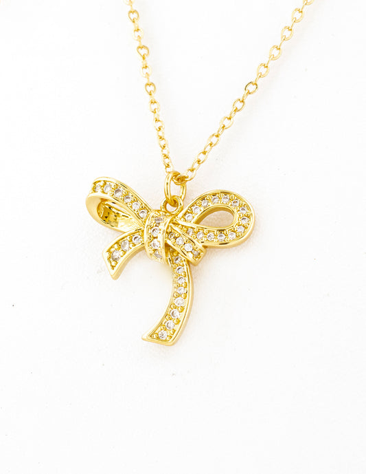 Dije Moño con Zirconias en Baño de Oro